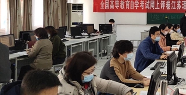 网上评卷作文等主观题打分如何统一标准？